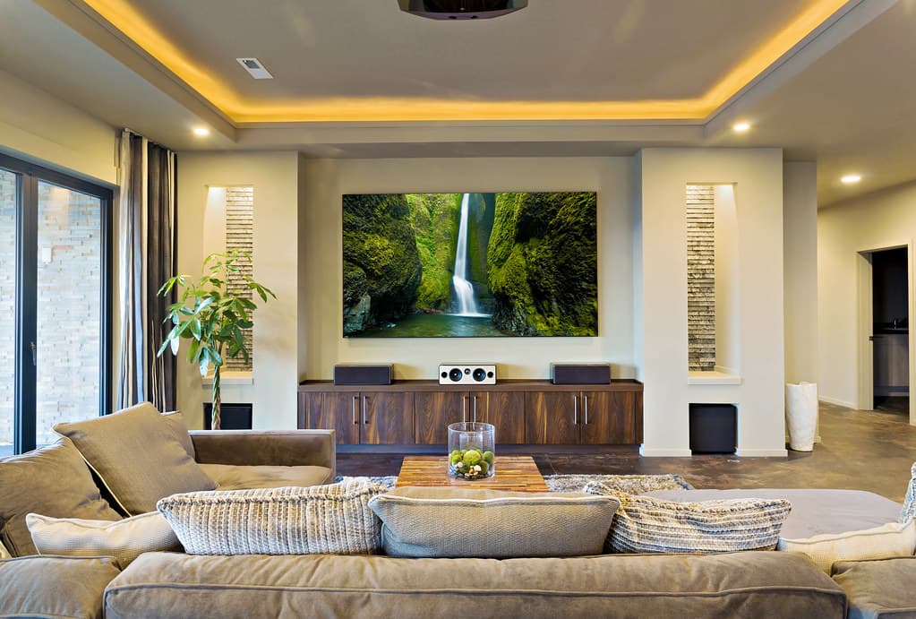 Bright, spotless modern living room with floor-to-ceiling windows